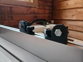 Table saw fence feather board attachment
