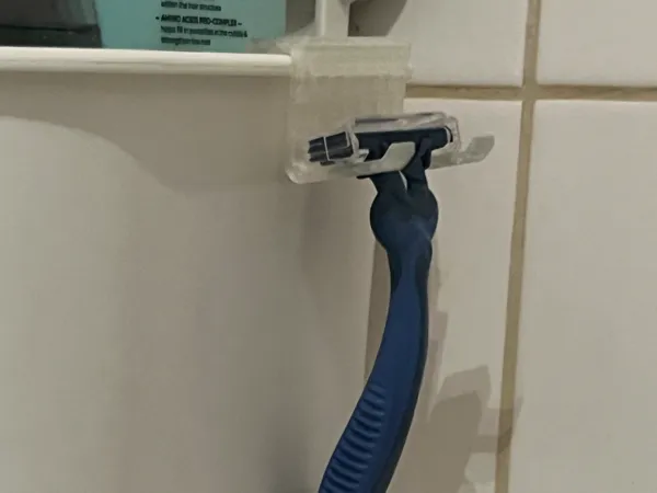 Porte-rasoir de salle de bain