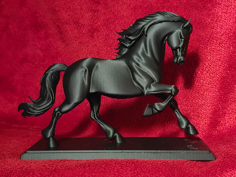 Running horse statuette
