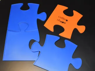 Cornice a forma di puzzle