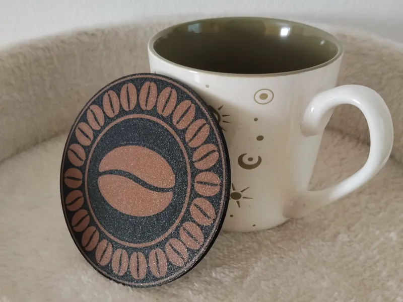 Coaster with a coffee bean pattern