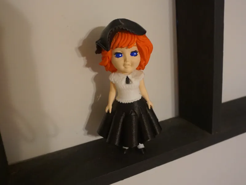 Doll with a black gem