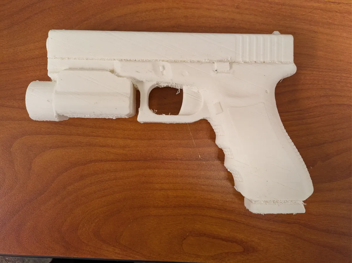 Réplique factice de pistolet avec lampe