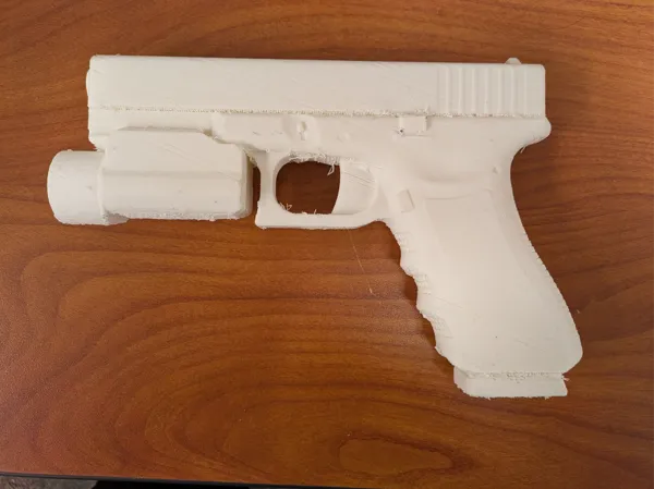 Réplique factice de pistolet avec lampe