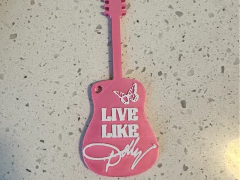 Llavero: Dolly Parton Keychain — referencia de MakerWorld