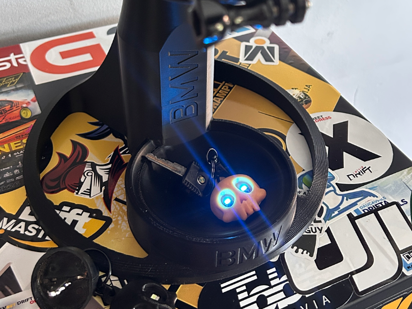 Moto helmet stand with wireless LED keychains 3D model