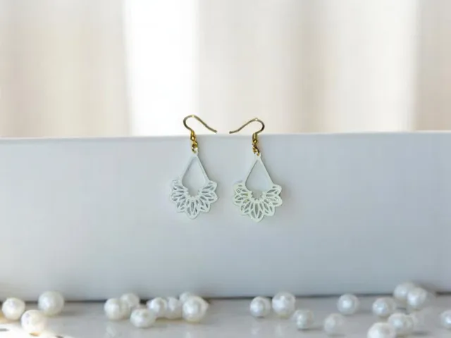 White ornament earrings