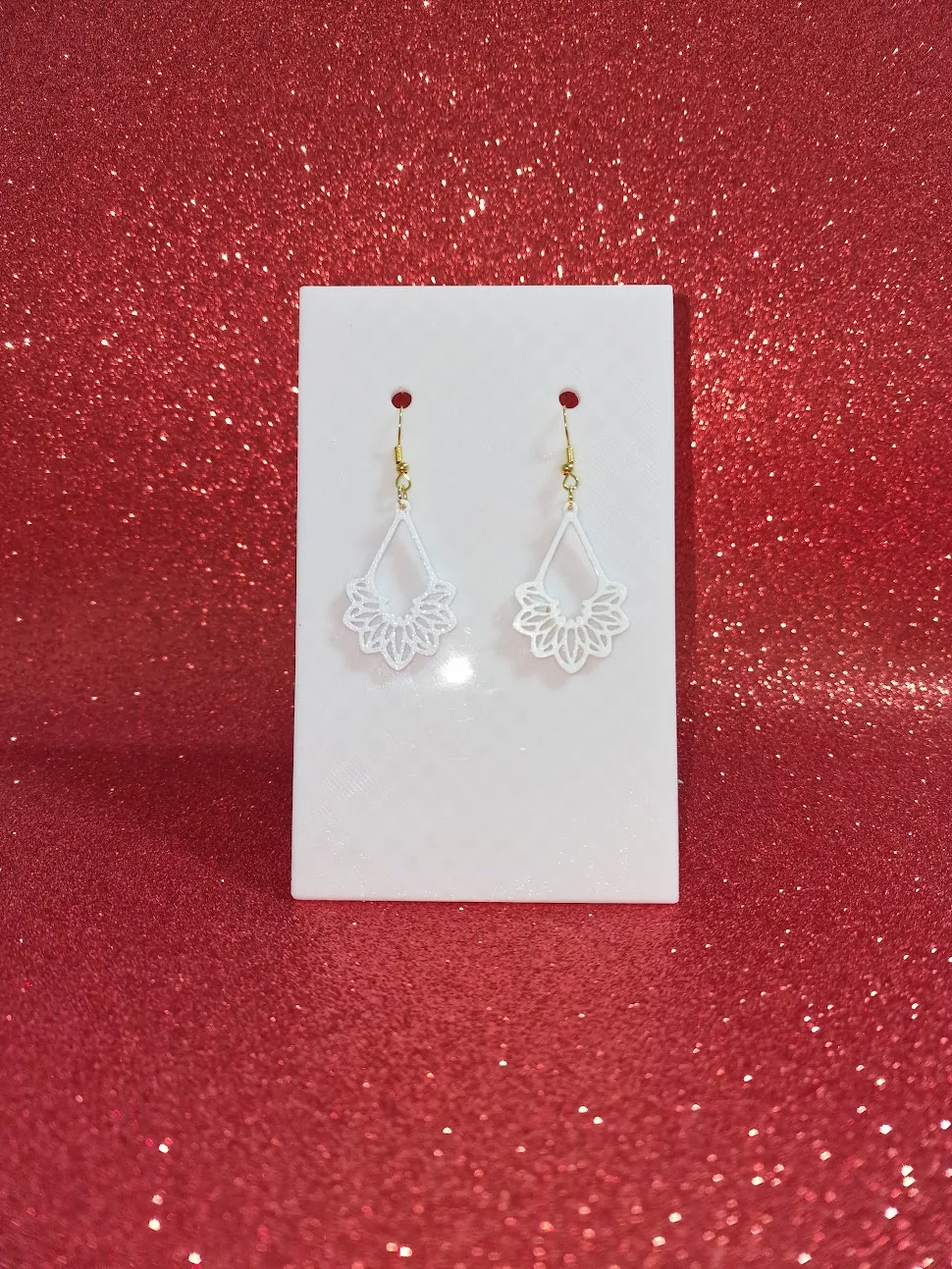 White ornament earrings view 2