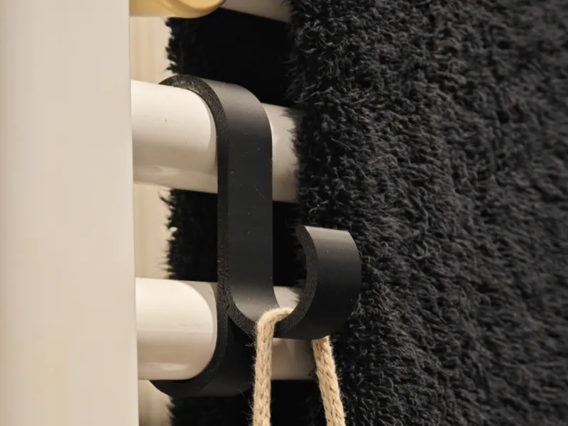 Bathroom radiator towel hanger