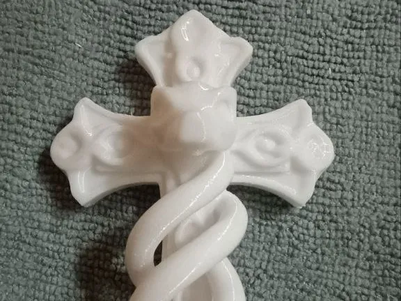 Cross with snake