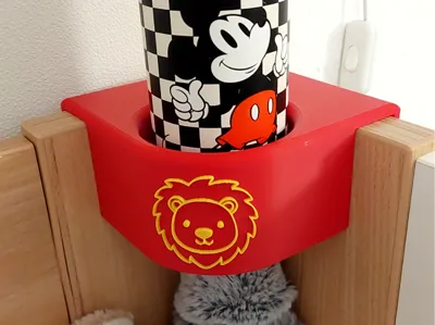 Bottle holder for the bed