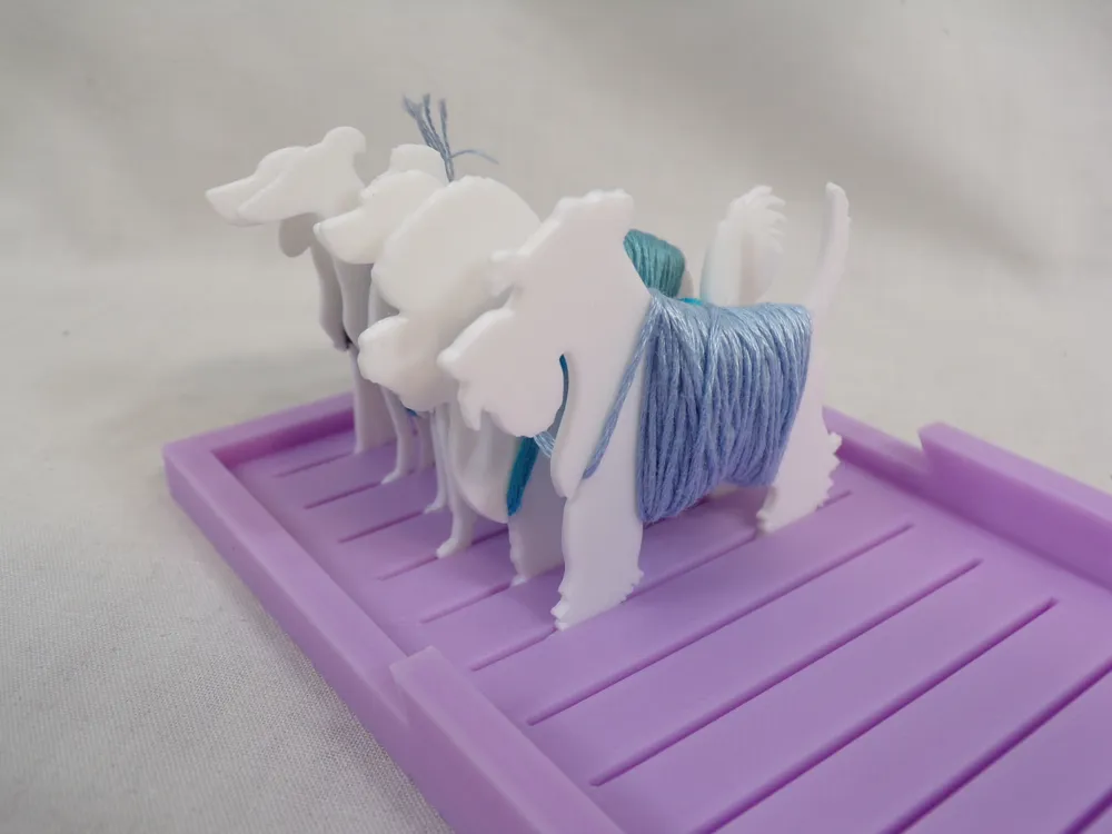 View of 52 Breeds of Dogs Embroidery Floss Bobbins - Free 3D Print Model ...