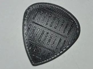 Guitar Pick with One-sided Grip