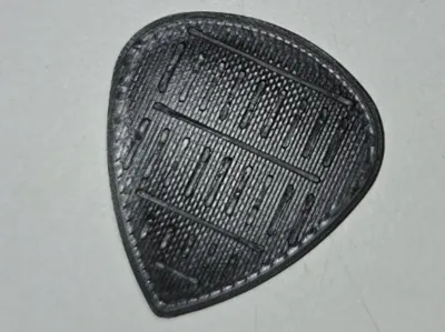 Guitar Pick with One-sided Grip