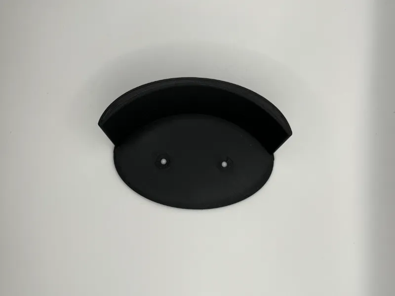 Wall mounted cap hanger