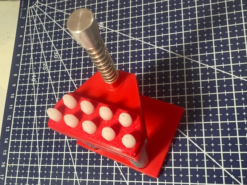Needle press tip organizer for watch hands
