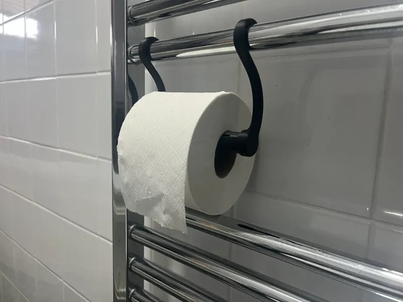 Towel rail toilet roll holder