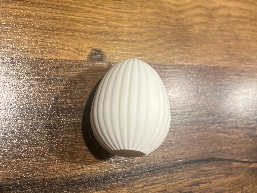 Ei zum aufhängen mit Öse gerade Ostern Wellen