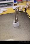 Vertical knife stand with built-in clasp