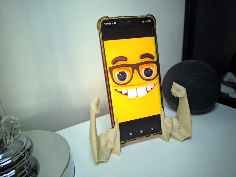 Funny muscular phone stand