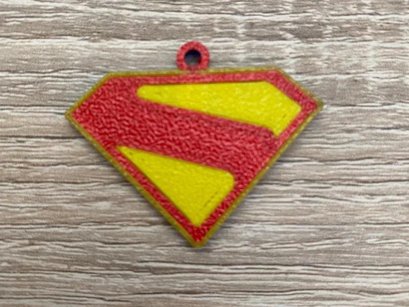 SUPERMAN KEYCHAIN and glass