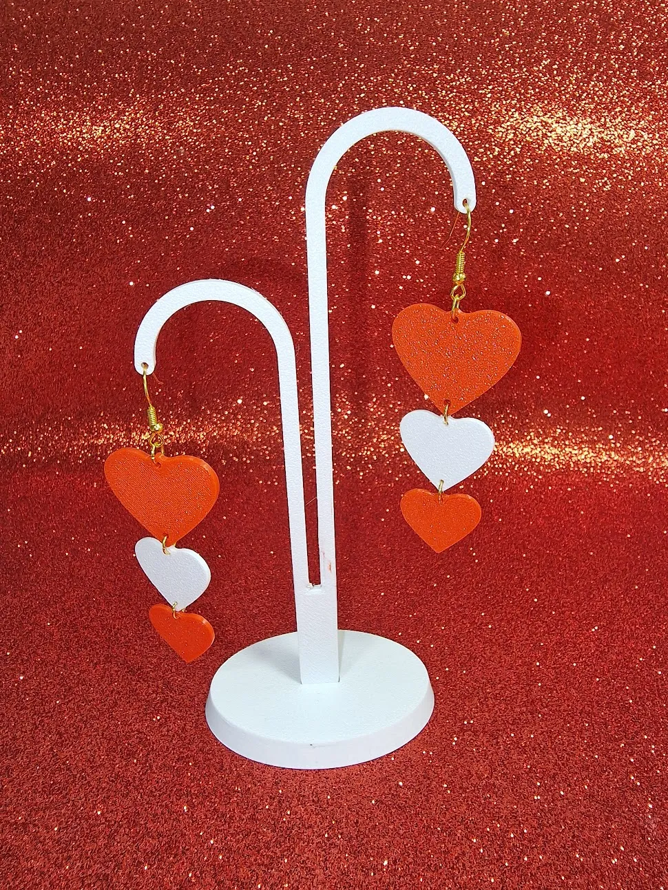 Three heart earrings view 3