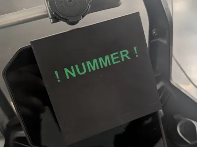 "Number" Plate, interchangeable plates reminder
