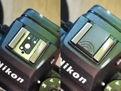 Speedlight cover plate for cameras