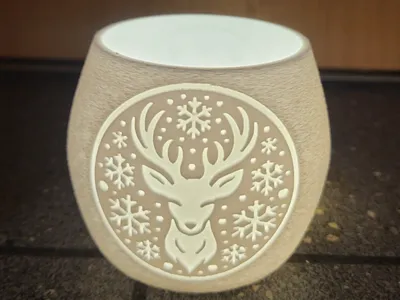 Tealight with Antlers and Snow