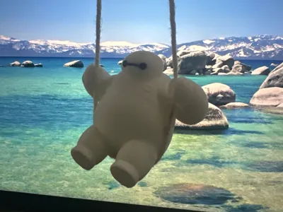 Baymax Swinging on a String