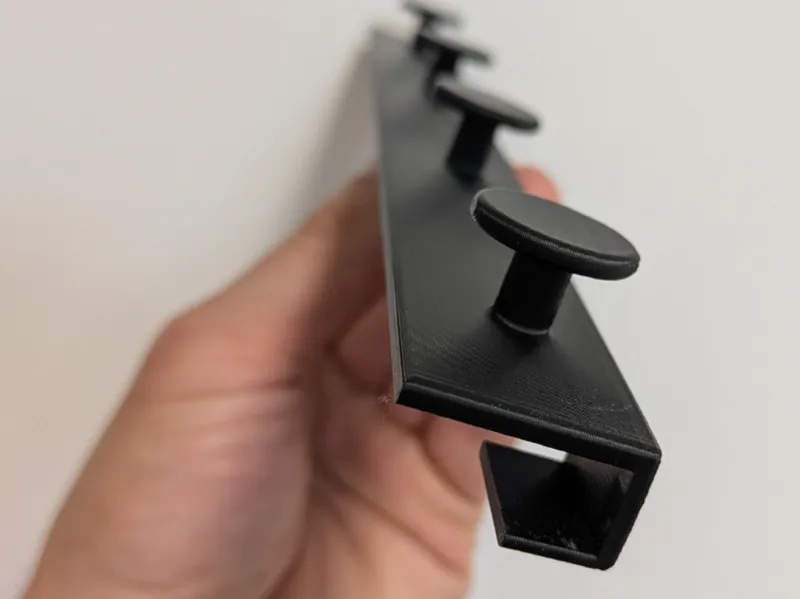 Door-mounted clothes hanger