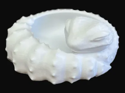 Sleeping leopard gecko feeding dish
