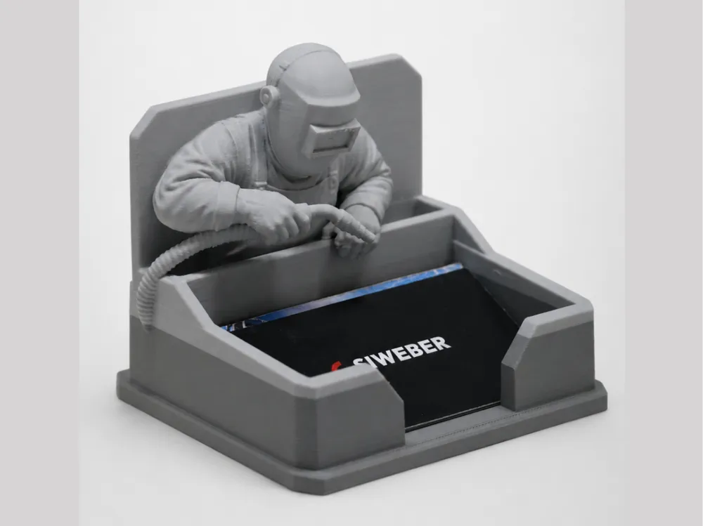 Soporte: Welder - Business Card Holder. Referencia del modelo original.
