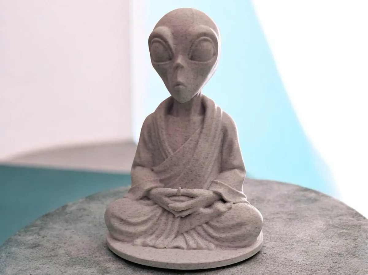 Statuette d'alien zen en méditation