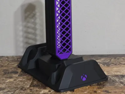 Dual controller and headset stand