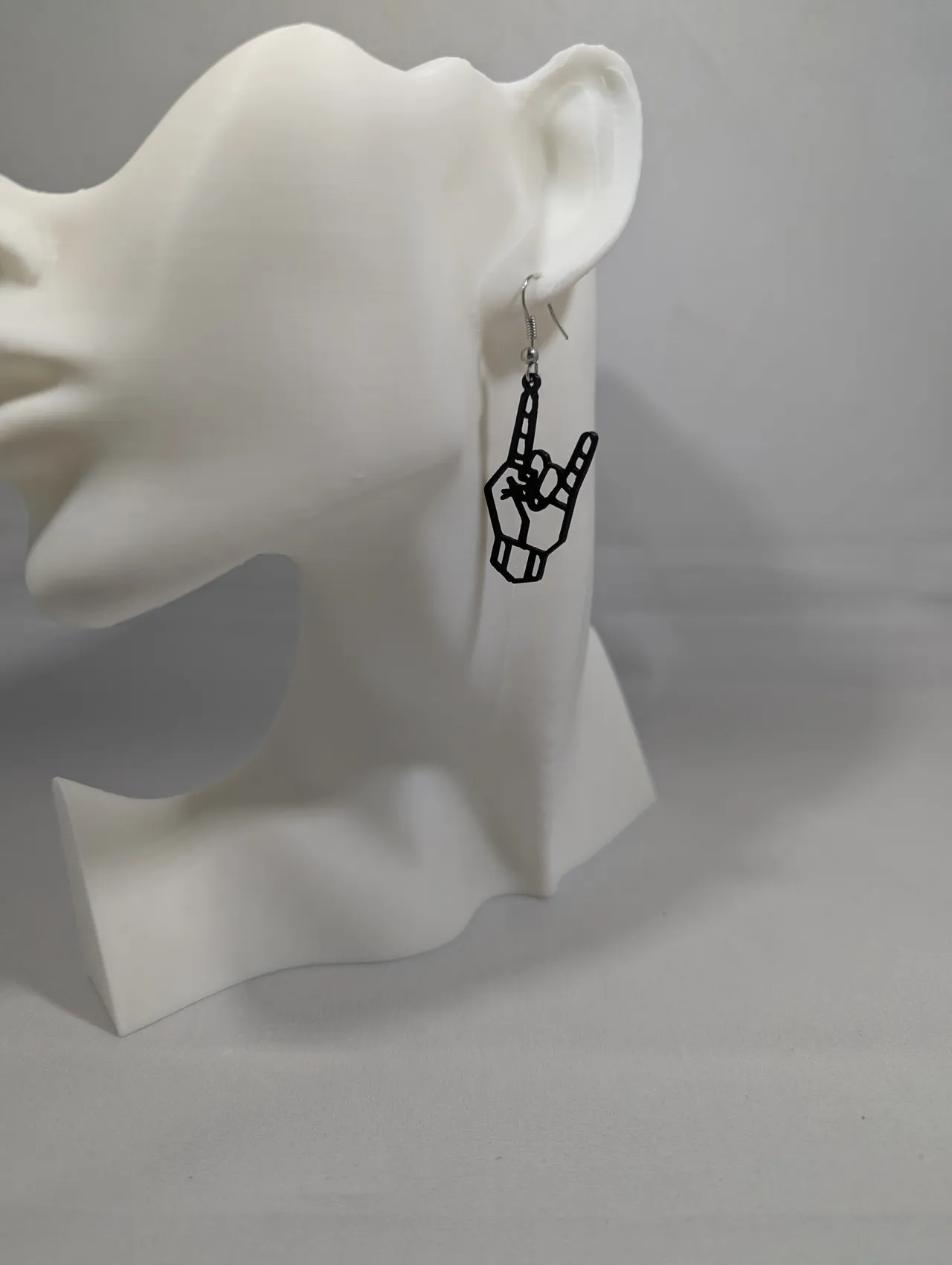 Metal hand earrings view 3