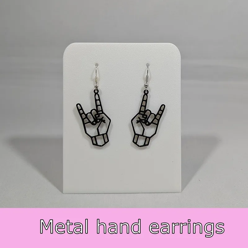 Metal hand earrings view 2