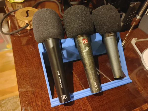Support triple pour microphones à main