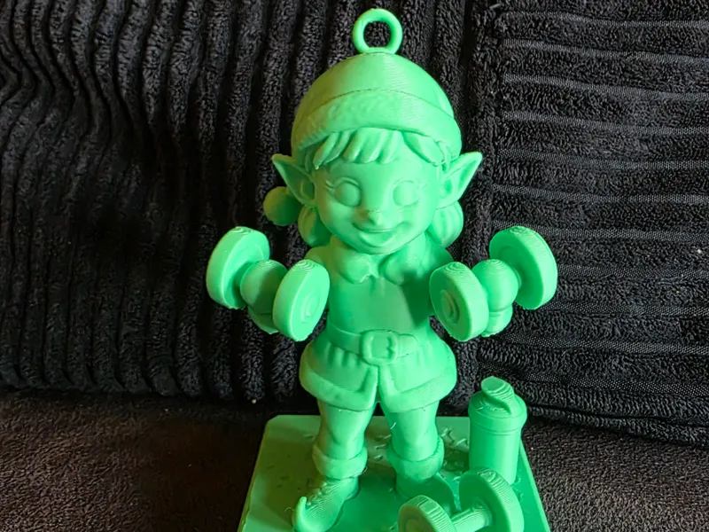Miss Elf strong Christmas ornament 