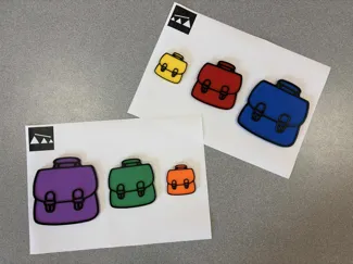 Boekentasjes sorteren volgens grootte
