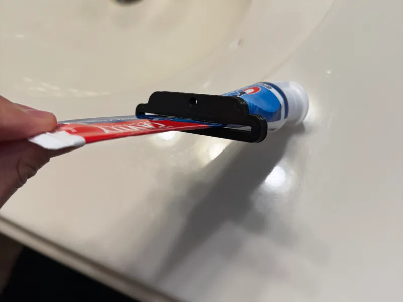 Toothpaste squeezer