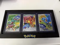 Resized to fit 3 Cards in Top Loaders