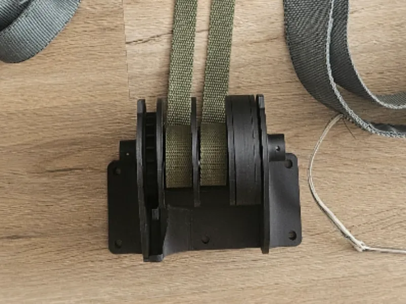 Inertia reel Aces II ejection seat harness riser