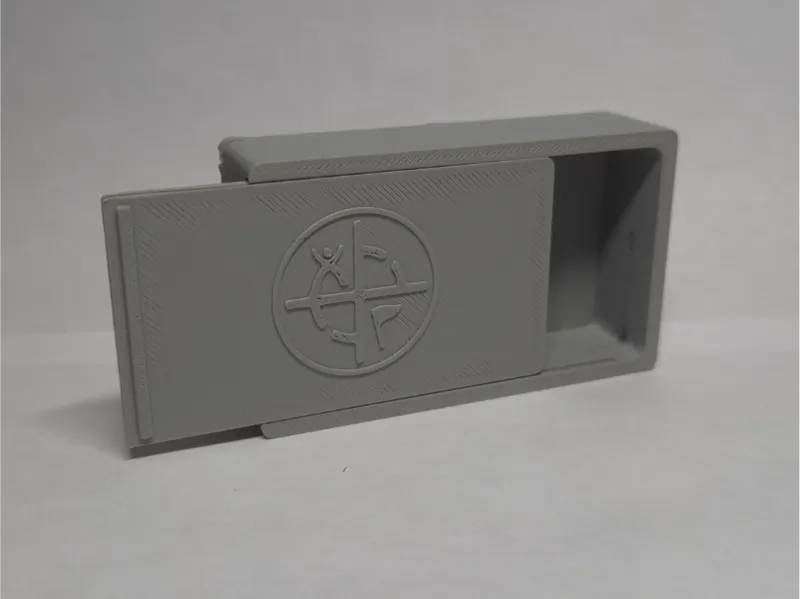 Geocache magnetic slide box
