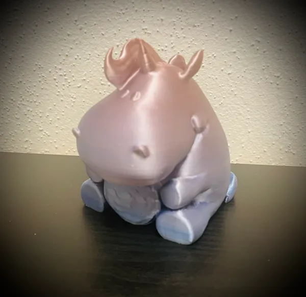 Licorne mignonne tenant un cookie