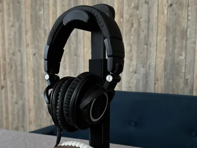 Telescopic headphones stand