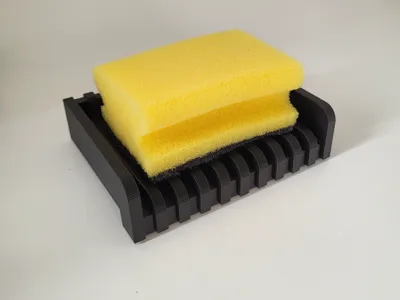 Sponge Dryer with Angled Drain Channels