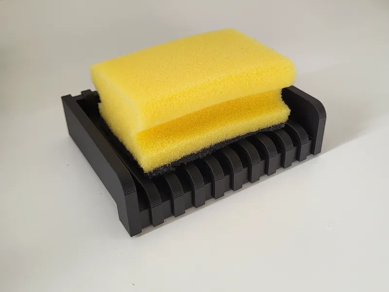 Sponge Dryer with Angled Drain Channels