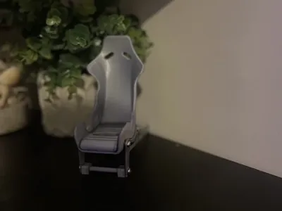 Racing car seat phone holder