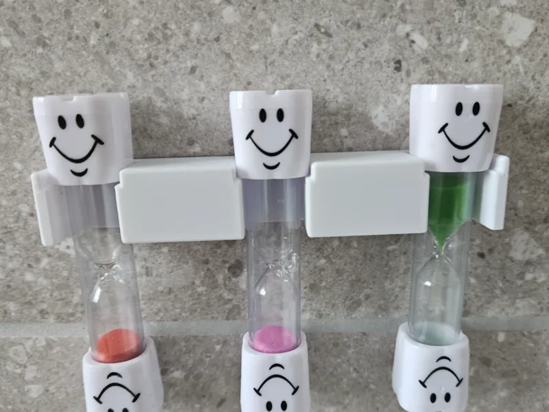 Hourglass holder for brushing teeth
